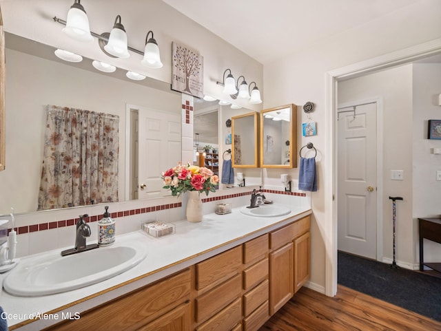 26370 S Hinds Dr, Saint Maries, ID 83861 - full bathroom featuring wood finished floors and double vanity