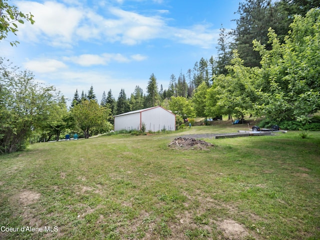26370 S Hinds Dr, Saint Maries, ID 83861 - view of grassy yard featuring an outbuilding