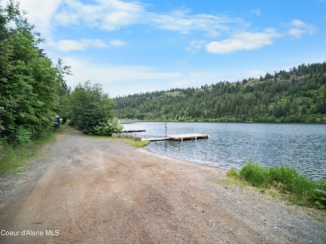 26370 S Hinds Dr, Saint Maries, ID 83861 - dock area with a wooded view, a water view, and a boat ramp