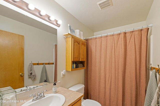 7260 N Courcelles Pkwy, Coeur Dalene, ID 83815 - full bathroom with vanity and a shower with shower curtain