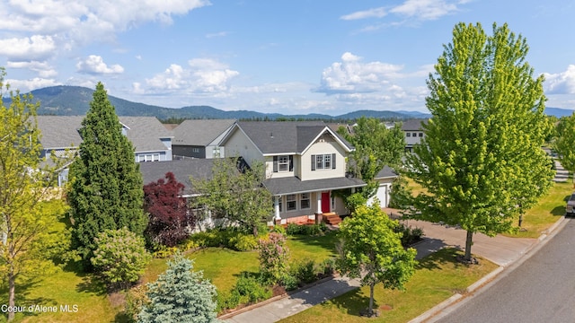 7260 N Courcelles Pkwy, Coeur Dalene, ID 83815 - view of front of property with a mountain view and a residential view