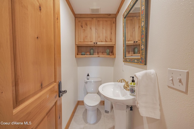 15964 N Songbird Ln, Rathdrum, ID 83858 - bathroom featuring toilet and tile patterned flooring