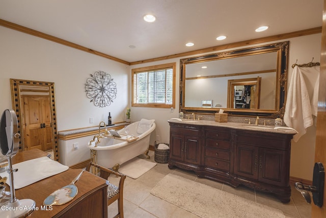 15964 N Songbird Ln, Rathdrum, ID 83858 - full bath featuring crown molding, double vanity, a freestanding bath, recessed lighting, and tile patterned flooring