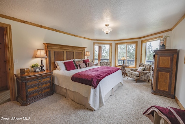 15964 N Songbird Ln, Rathdrum, ID 83858 - bedroom featuring crown molding, carpet, and a textured ceiling