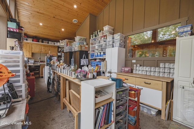 15964 N Songbird Ln, Rathdrum, ID 83858 - kitchen with vaulted ceiling, wood ceiling, carpet, recessed lighting, and light countertops
