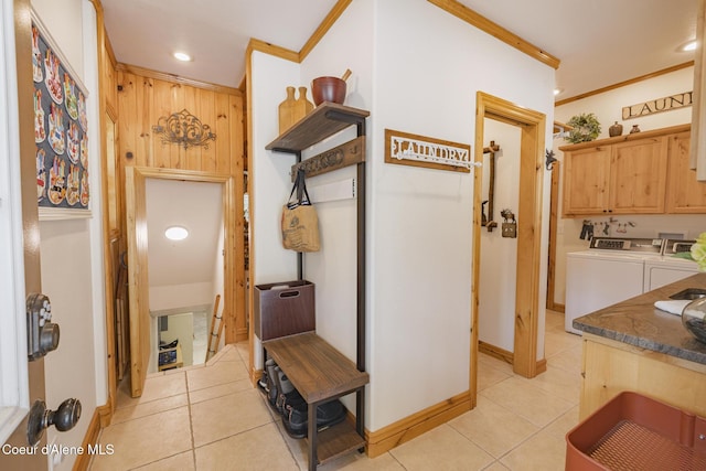 15964 N Songbird Ln, Rathdrum, ID 83858 - corridor with light tile patterned floors, washing machine and clothes dryer, crown molding, and recessed lighting