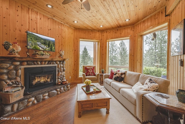 15964 N Songbird Ln, Rathdrum, ID 83858 - living room with hardwood / wood-style floors, wooden ceiling, a fireplace, recessed lighting, and ceiling fan