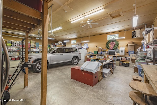 15964 N Songbird Ln, Rathdrum, ID 83858 - garage featuring a workshop area and ceiling fan