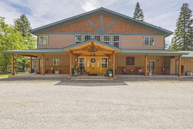 15964 N Songbird Ln, Rathdrum, ID 83858 - view of front of property featuring a porch and roof with shingles