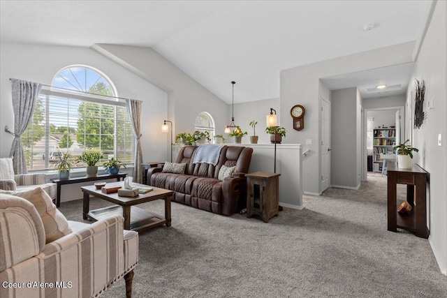 2574 W Sarge Ct, Coeur Dalene, ID 83815 - living room with carpet floors, lofted ceiling, and baseboards