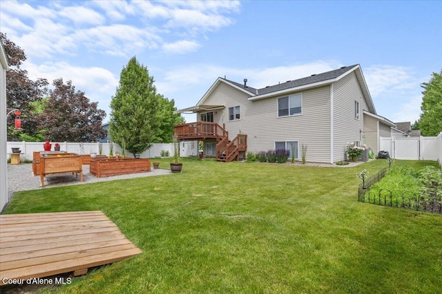 2574 W Sarge Ct, Coeur Dalene, ID 83815 - rear view of property with a garden, a wooden deck, and stairs
