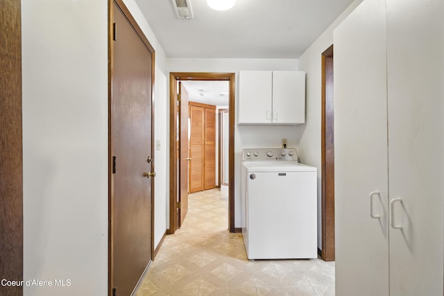 1031 N 11th St, Coeur Dalene, ID 83814 - laundry area featuring washer / clothes dryer, light flooring, cabinet space, and baseboards