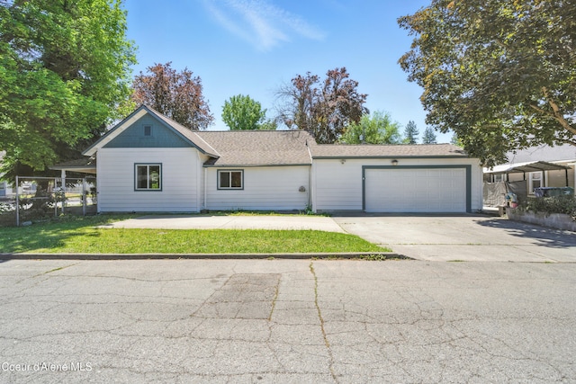 1031 N 11th St, Coeur Dalene, ID 83814 - view of front of home featuring driveway and a garage