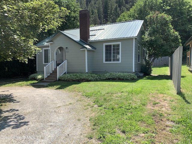 705 S Division St, Kellogg, ID 83837 - bungalow featuring a chimney and metal roof