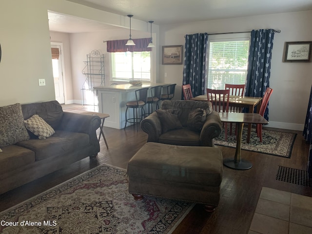 705 S Division St, Kellogg, ID 83837 - living room with wood finished floors and baseboards