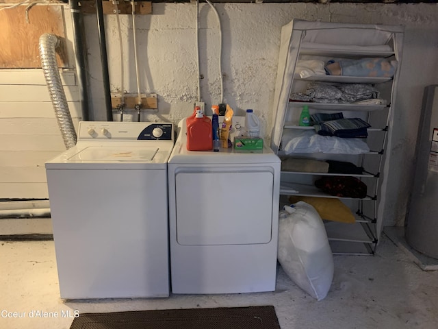 705 S Division St, Kellogg, ID 83837 - laundry area featuring separate washer and dryer and water heater
