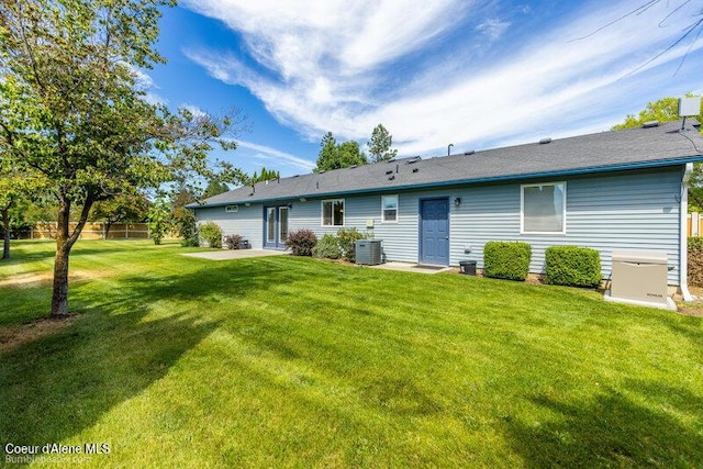 1555 W Benjamin Ave, Coeur Dalene, ID 83815 - rear view of property with a patio