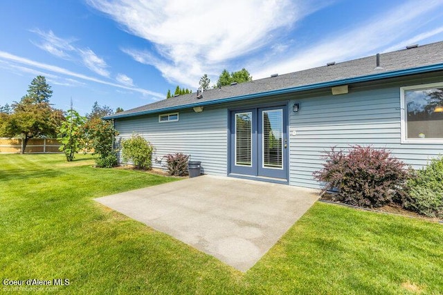 1555 W Benjamin Ave, Coeur Dalene, ID 83815 - rear view of property with a patio