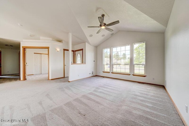 1555 W Benjamin Ave, Coeur Dalene, ID 83815 - spare room with lofted ceiling, a ceiling fan, and light colored carpet
