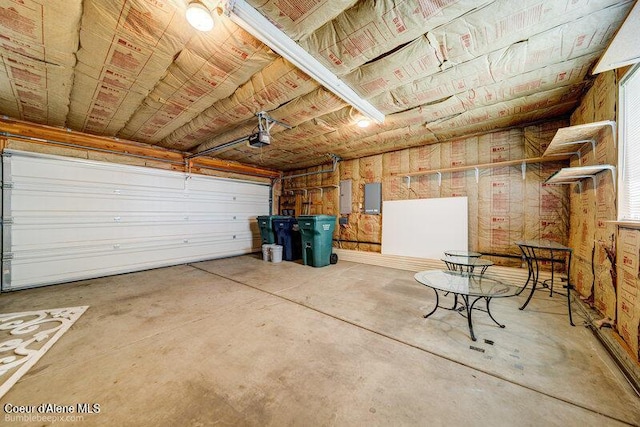 1555 W Benjamin Ave, Coeur Dalene, ID 83815 - garage with a garage door opener and electric panel