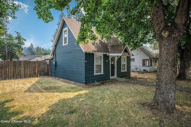 1412/1414 N 13th St, Coeur Dalene, ID 83814 - view of front of house featuring roof with shingles