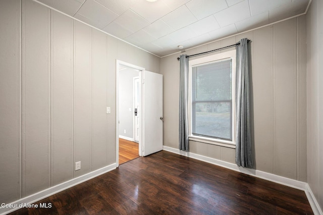 1412/1414 N 13th St, Coeur Dalene, ID 83814 - unfurnished room featuring a decorative wall and wood finished floors