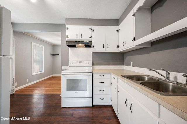 1412/1414 N 13th St, Coeur Dalene, ID 83814 - kitchen featuring white appliances, under cabinet range hood, dark wood-type flooring, white cabinets, and tasteful backsplash