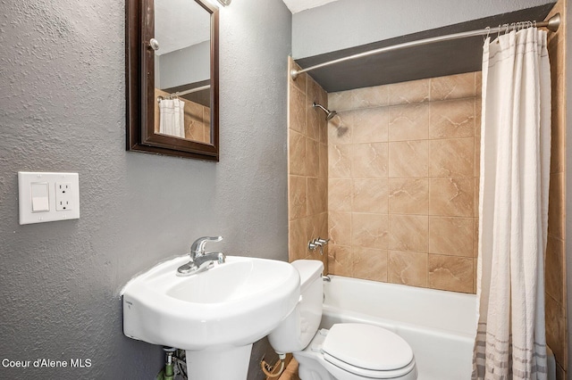 1412/1414 N 13th St, Coeur Dalene, ID 83814 - bathroom with a textured wall and shower / tub combo with curtain