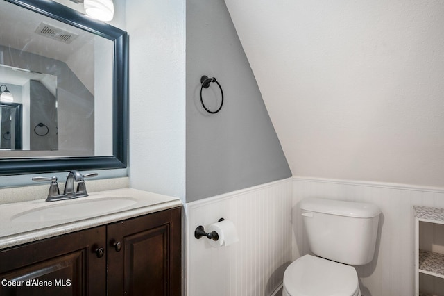 1412/1414 N 13th St, Coeur Dalene, ID 83814 - bathroom with a wainscoted wall and vanity