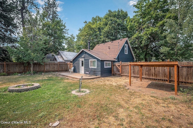 1412/1414 N 13th St, Coeur Dalene, ID 83814 - back of house featuring a fenced backyard