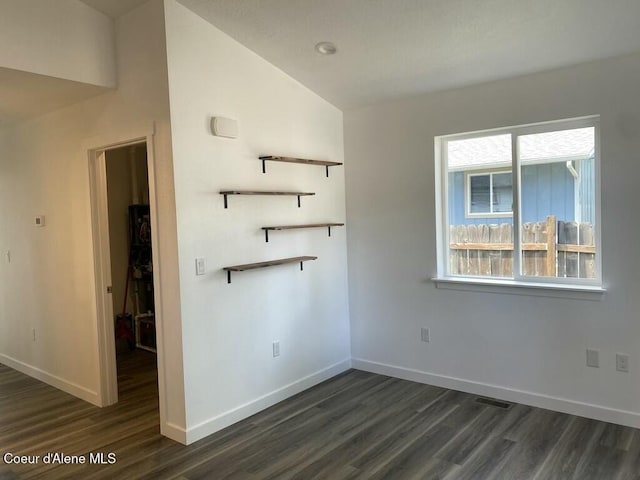 1412/1414 N 13th St, Coeur Dalene, ID 83814 - empty room featuring dark wood-style floors and baseboards