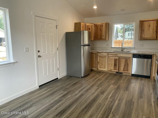 1412/1414 N 13th St, Coeur Dalene, ID 83814 - kitchen featuring appliances with stainless steel finishes, dark wood-style floors, light stone counters, brown cabinetry, and recessed lighting