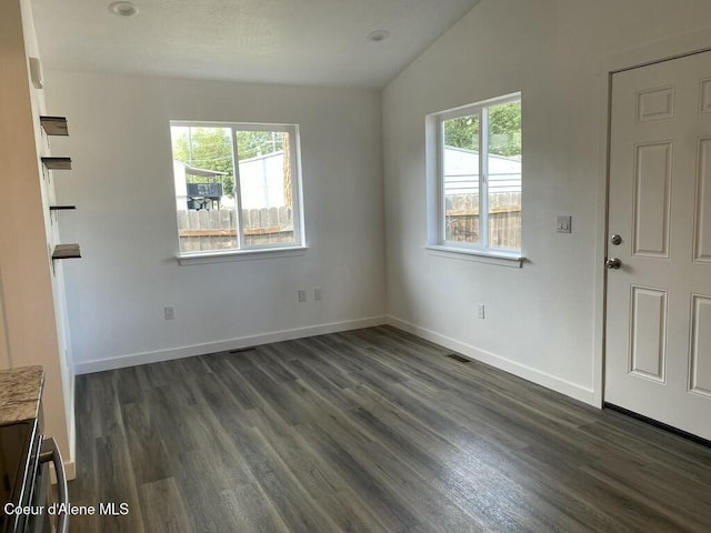 1412/1414 N 13th St, Coeur Dalene, ID 83814 - unfurnished room with lofted ceiling and dark wood finished floors