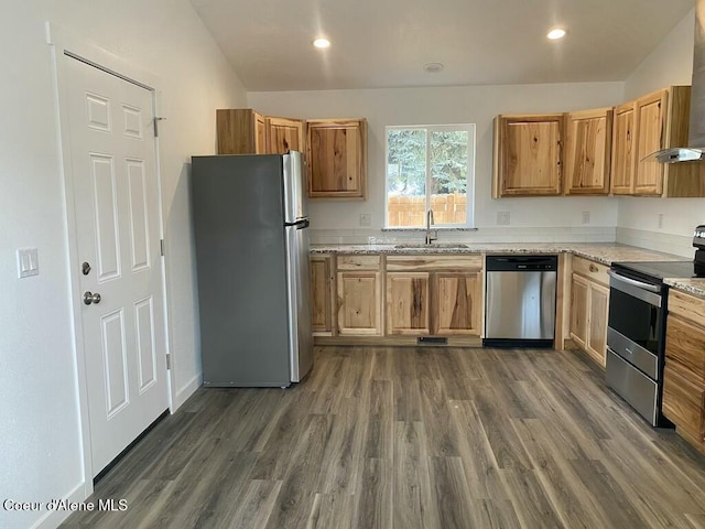 1412/1414 N 13th St, Coeur Dalene, ID 83814 - kitchen featuring stainless steel appliances, dark wood-style flooring, light stone counters, wall chimney range hood, and recessed lighting