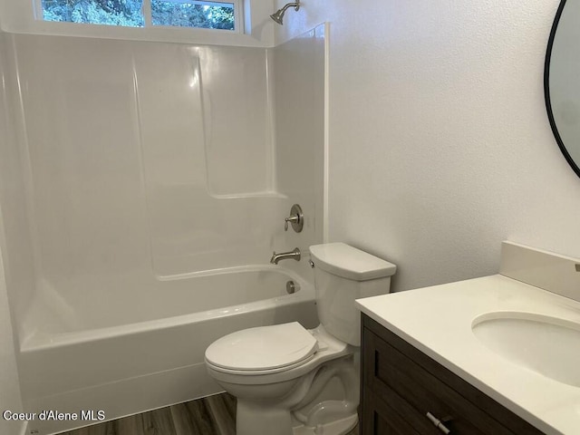 1412/1414 N 13th St, Coeur Dalene, ID 83814 - full bathroom featuring tub / shower combination, vanity, and wood finished floors