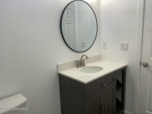 1412/1414 N 13th St, Coeur Dalene, ID 83814 - bathroom with vanity and toilet