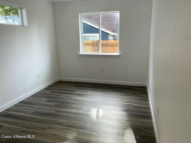 1412/1414 N 13th St, Coeur Dalene, ID 83814 - unfurnished room with baseboards and dark wood finished floors