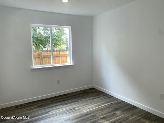 1412/1414 N 13th St, Coeur Dalene, ID 83814 - unfurnished room with dark wood-style floors and recessed lighting
