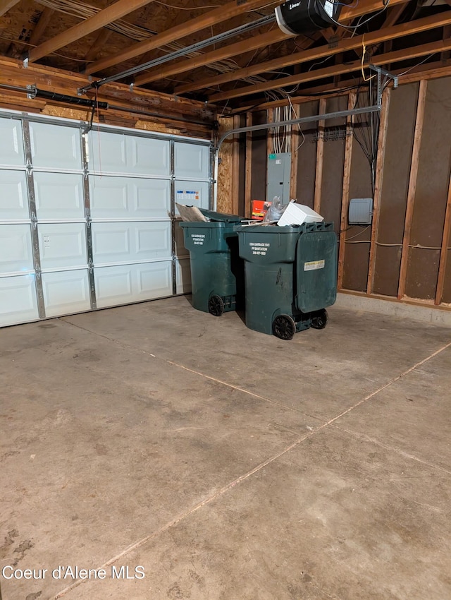 902 E Glacier Peak Dr, Post Falls, ID 83854 - garage with electric panel and a garage door opener