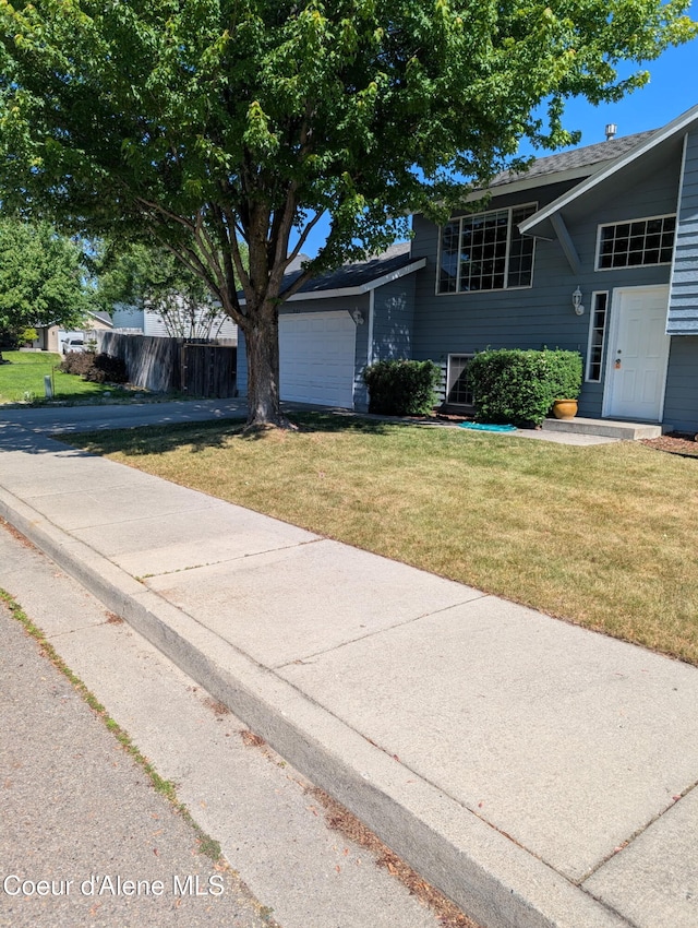 902 E Glacier Peak Dr, Post Falls, ID 83854 - view of front of home featuring an attached garage
