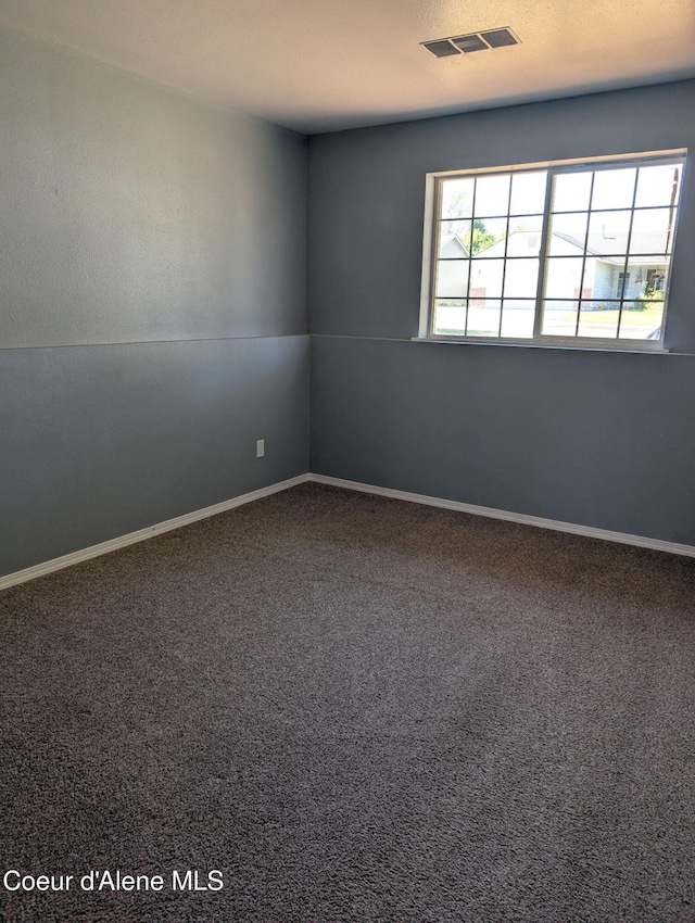 902 E Glacier Peak Dr, Post Falls, ID 83854 - carpeted spare room with baseboards
