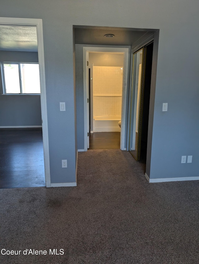 902 E Glacier Peak Dr, Post Falls, ID 83854 - hallway with carpet and baseboards