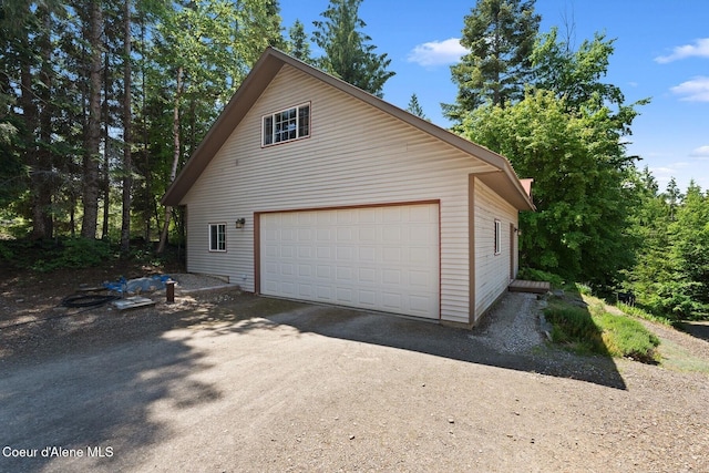 343 W Spring Creek Rd, Hope, ID 83836 - view of property exterior with a detached garage and an outdoor structure
