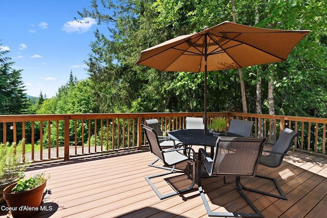 343 W Spring Creek Rd, Hope, ID 83836 - wooden deck with outdoor dining space