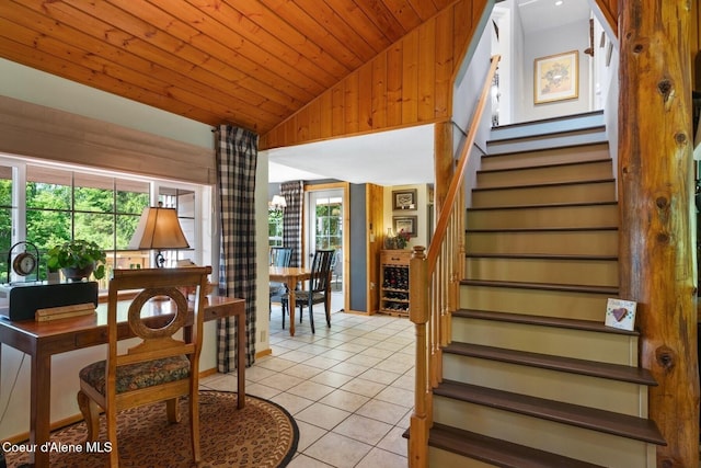 343 W Spring Creek Rd, Hope, ID 83836 - dining room featuring stairway, light tile patterned floors, wood ceiling, high vaulted ceiling, and wood walls