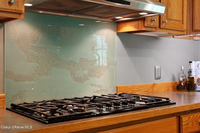 343 W Spring Creek Rd, Hope, ID 83836 - kitchen featuring black gas cooktop, custom exhaust hood, and brown cabinets