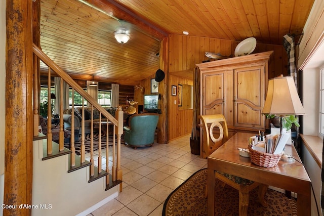 343 W Spring Creek Rd, Hope, ID 83836 - living area featuring wood ceiling, vaulted ceiling, wooden walls, light tile patterned flooring, and stairs
