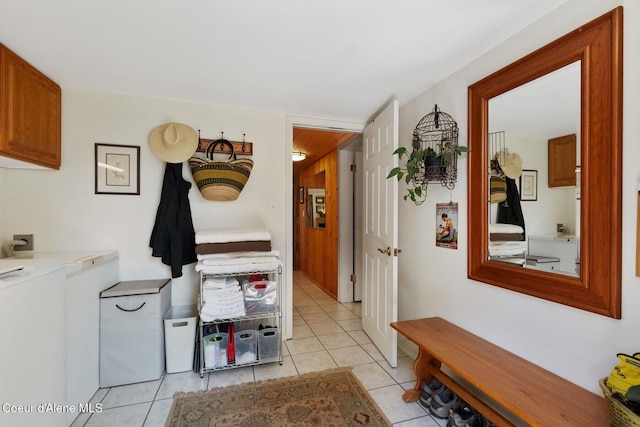 343 W Spring Creek Rd, Hope, ID 83836 - laundry room featuring cabinet space, light tile patterned floors, and separate washer and dryer