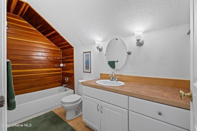 343 W Spring Creek Rd, Hope, ID 83836 - bathroom with vanity, toilet, a tub, wood finished floors, and a textured wall