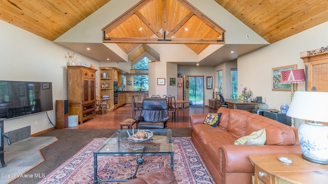75 Windy Ln, Moyie Springs, ID 83845 - living area featuring wood ceiling with exposed beams, high vaulted ceiling, recessed lighting, carpet floors, and baseboards
